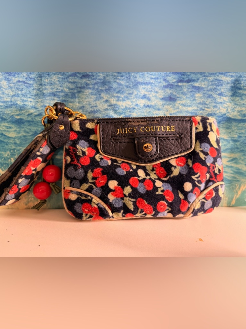 Juicy Couture Navy Floral Cherry Wristlet with Red Cherry Accents